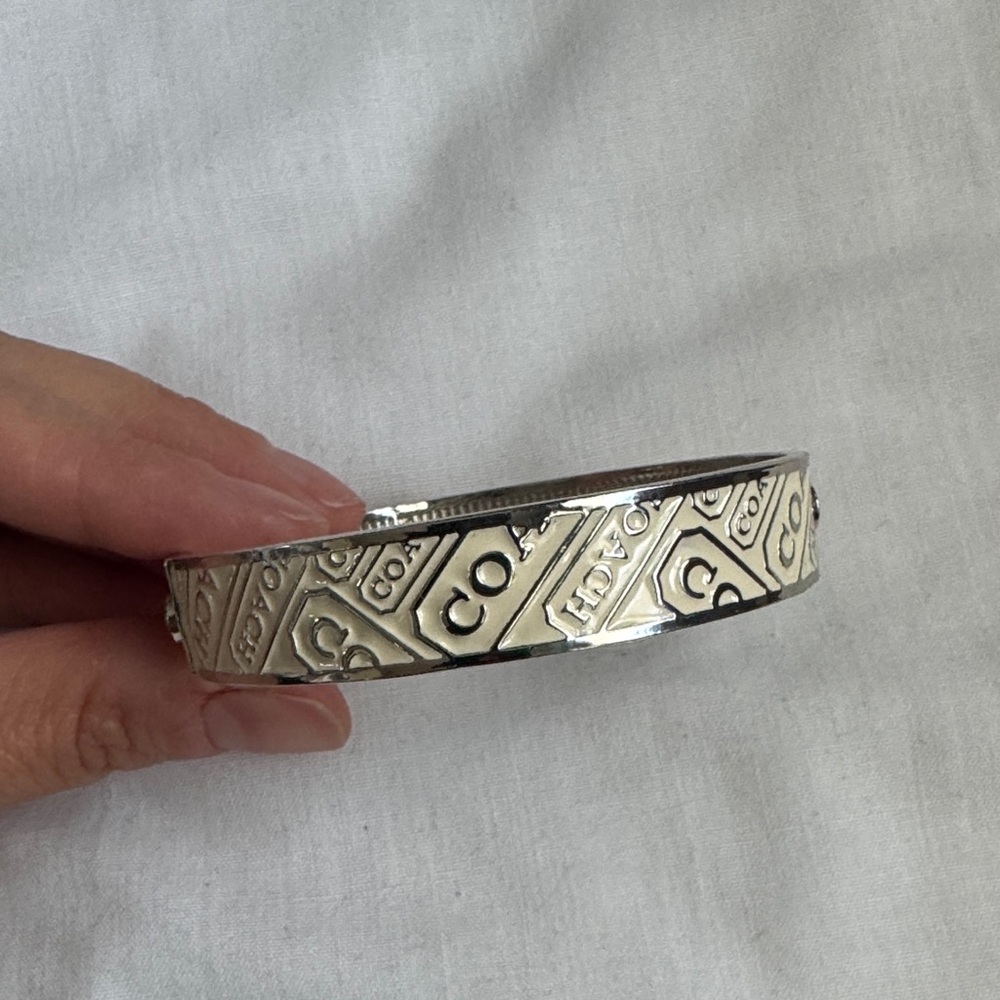 Coach Embossed White Enamel and Silver Bangle Bracelet